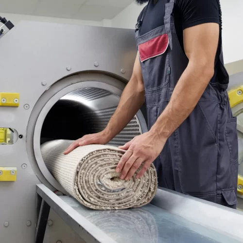 man-operating-drying-machine-carpet-cleaning-professional-carpet-cleaning-service_130111-4319